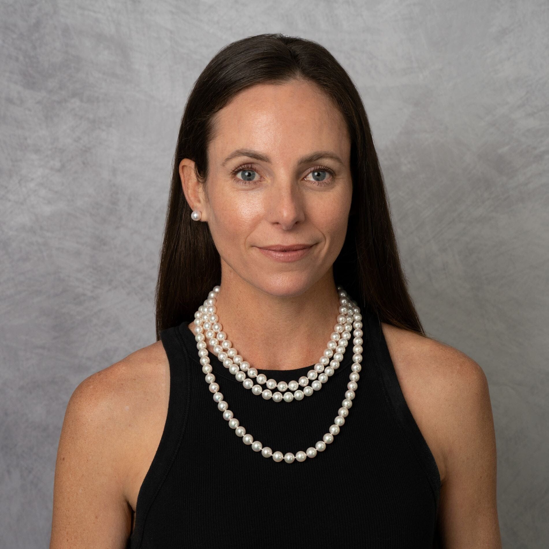 Model wearing 16, 18 and 22 inch strands of 9-9.5 mm Akoya pearls