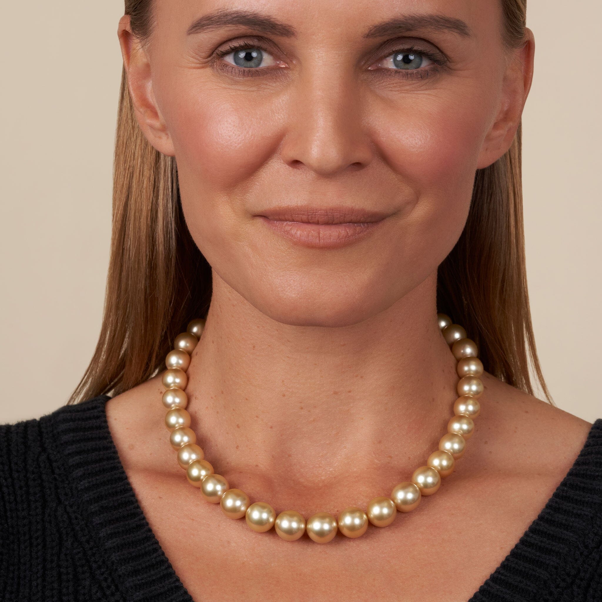 10.0-13.2 mm AA+/AAA Golden South Sea Round Pearl Necklace on model