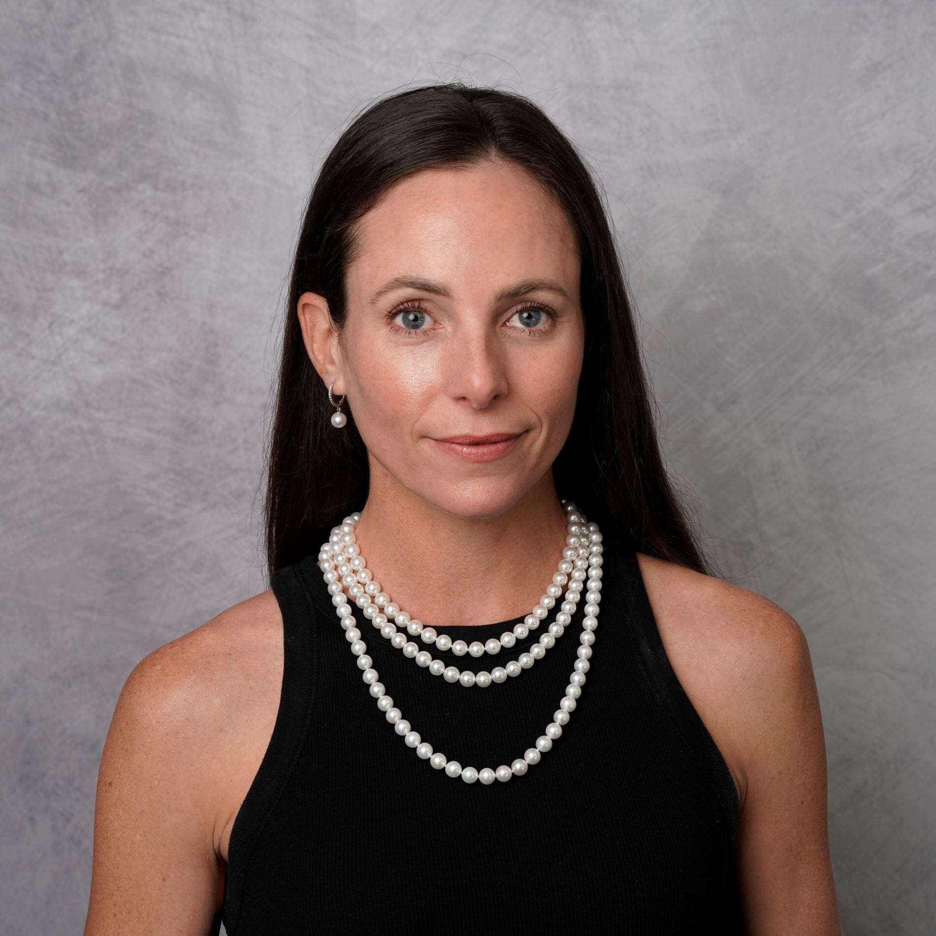 Model wearing 16, 18 and 22 inch strands of 8.5-9 mm Akoya Pearls